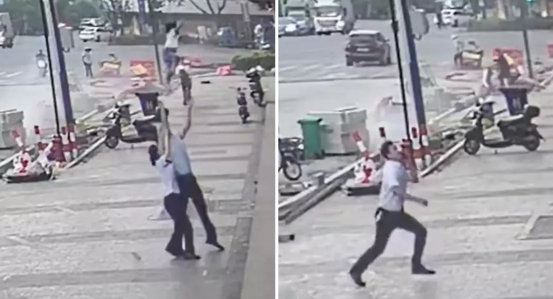 O homem estava falando ao telefone, acompanhado de uma mulher, quando percebeu que a criança estava prestes a cair da janela